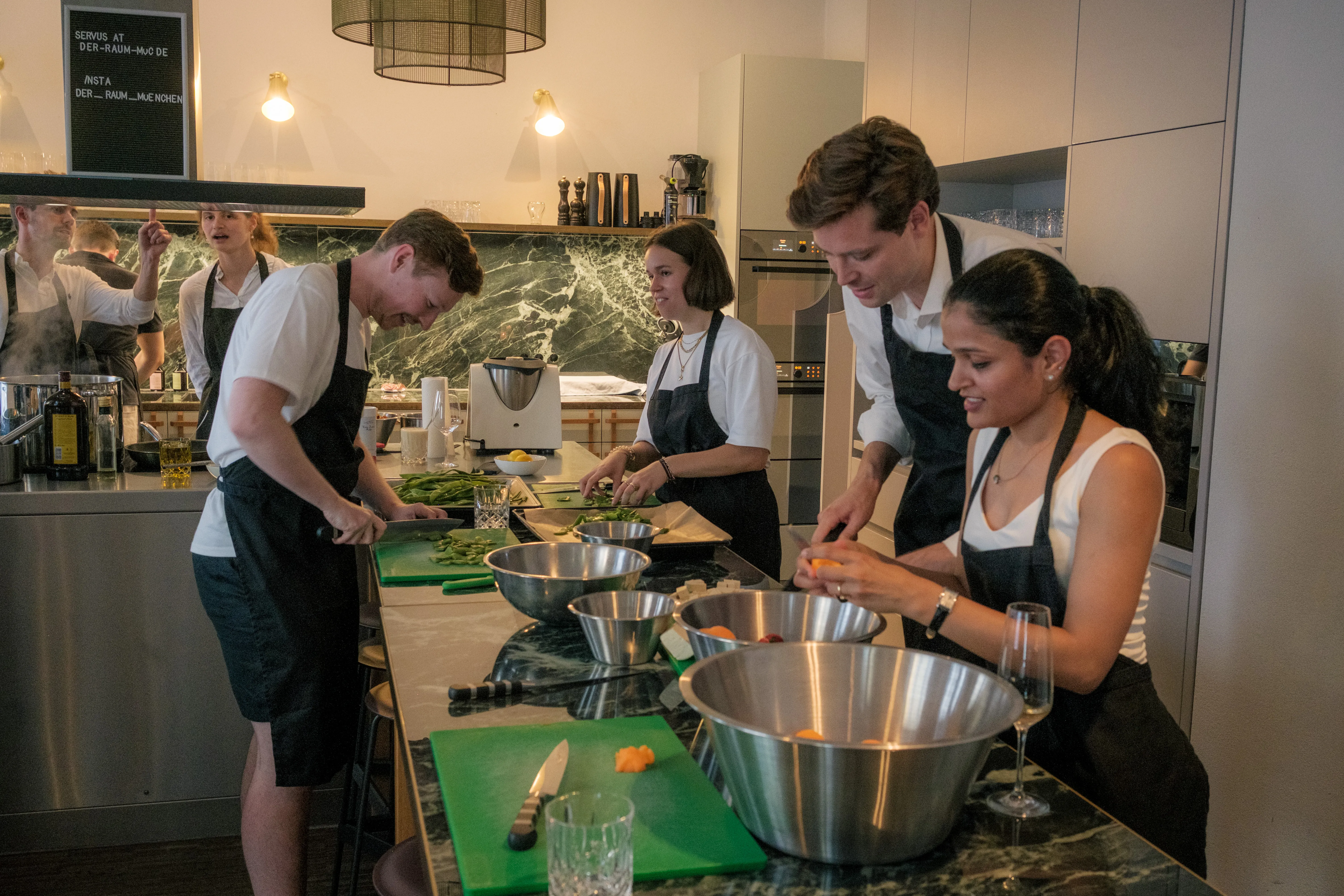 Preparing food at the team cooking class