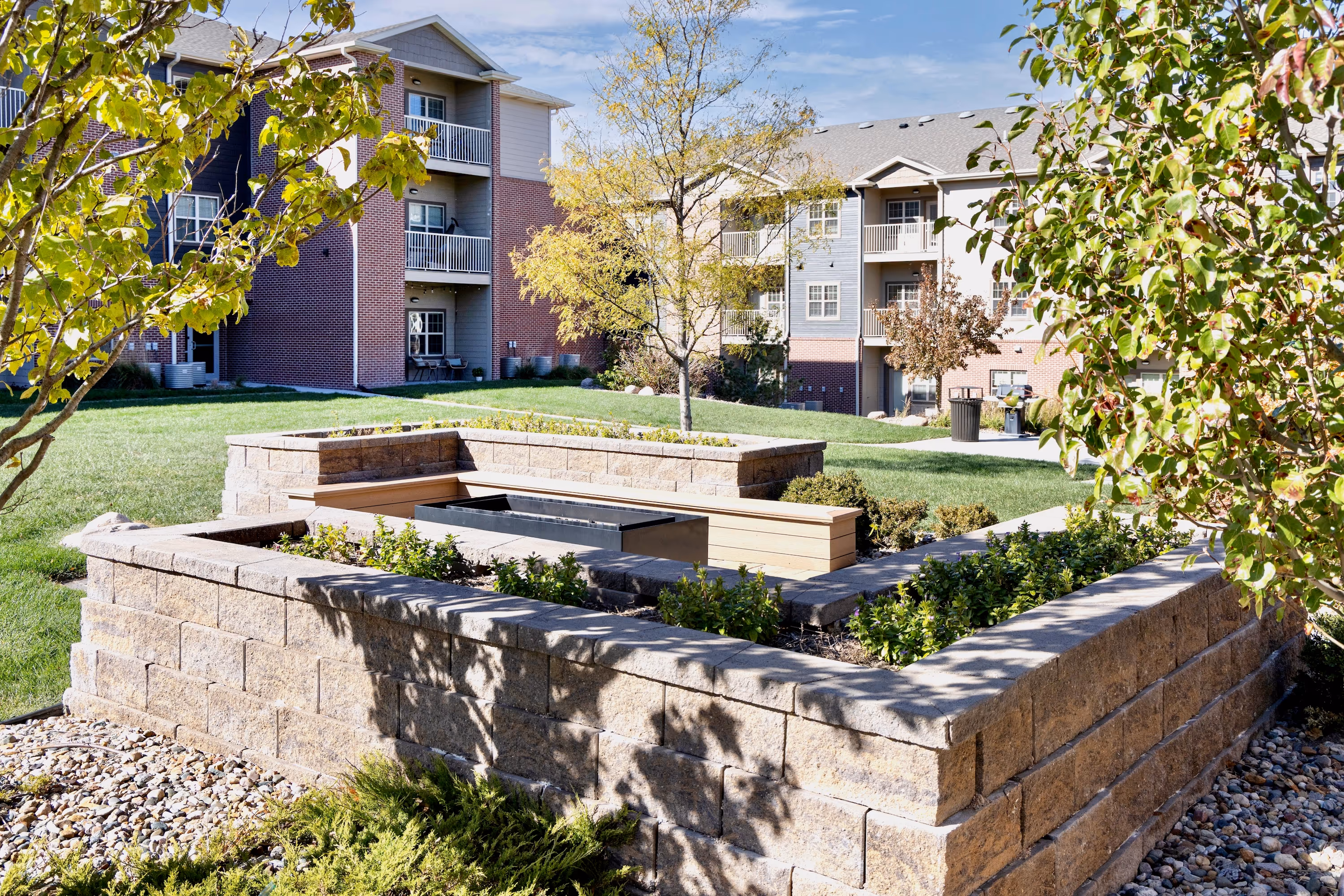 Chairs surrounding firepit outside 