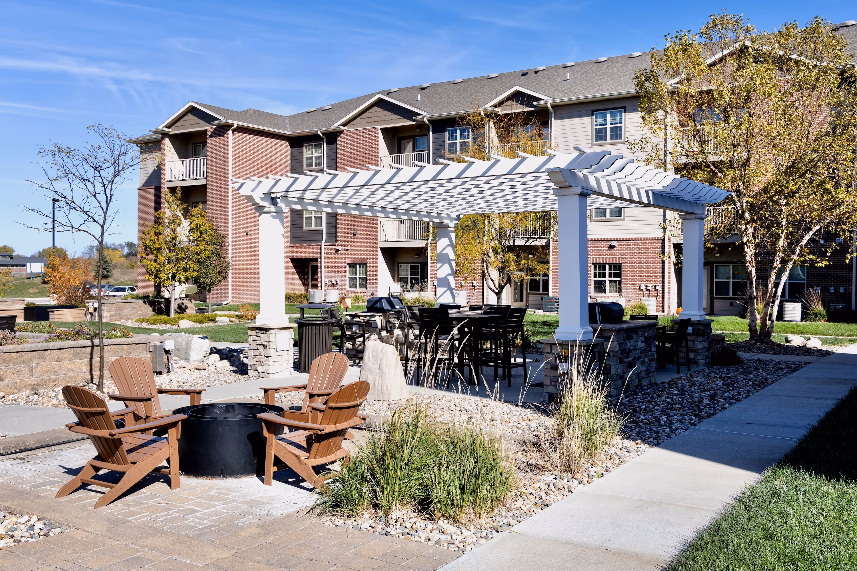 Outdoor grilling area with benches
