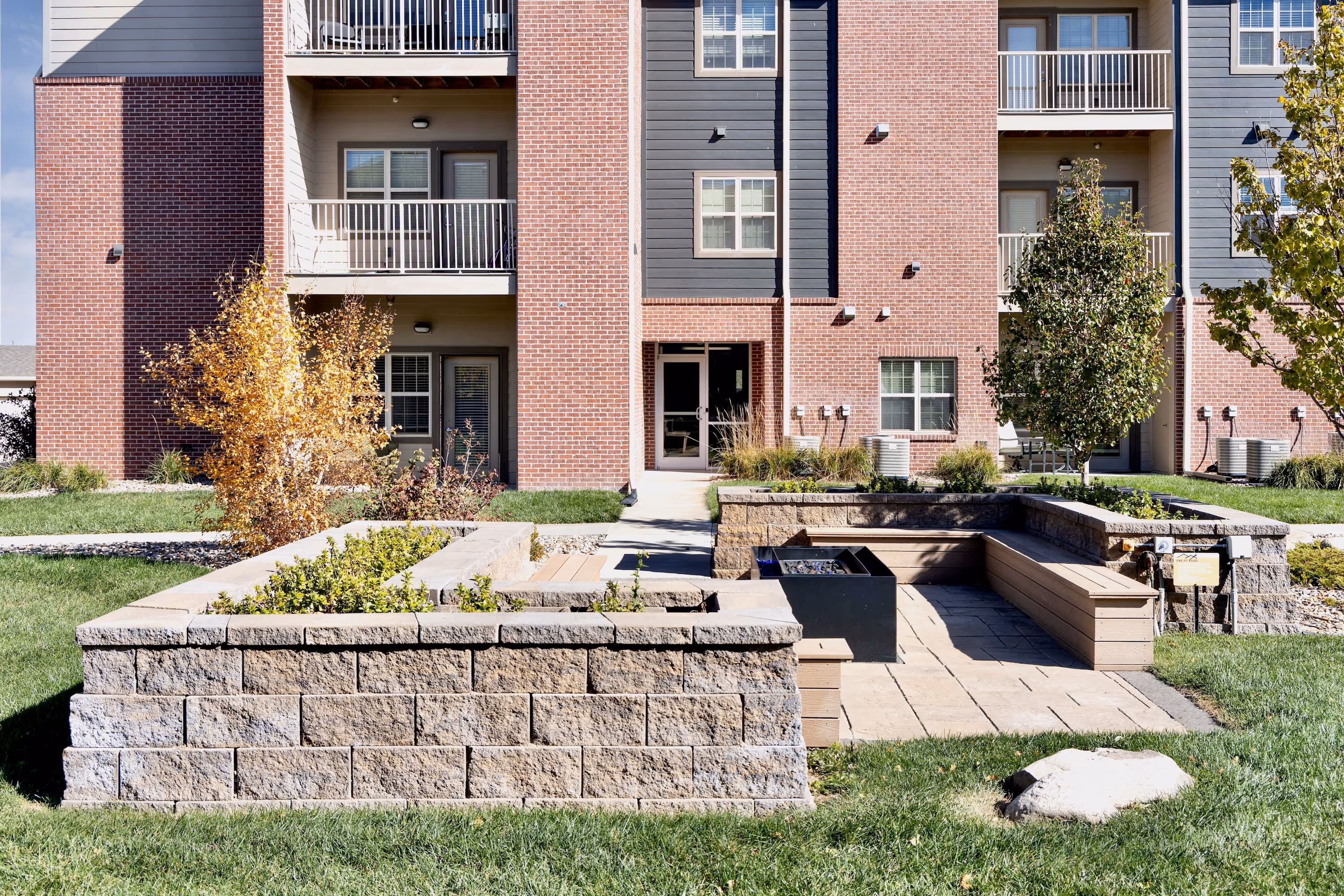 Courtyard with outdoor seating a firepit