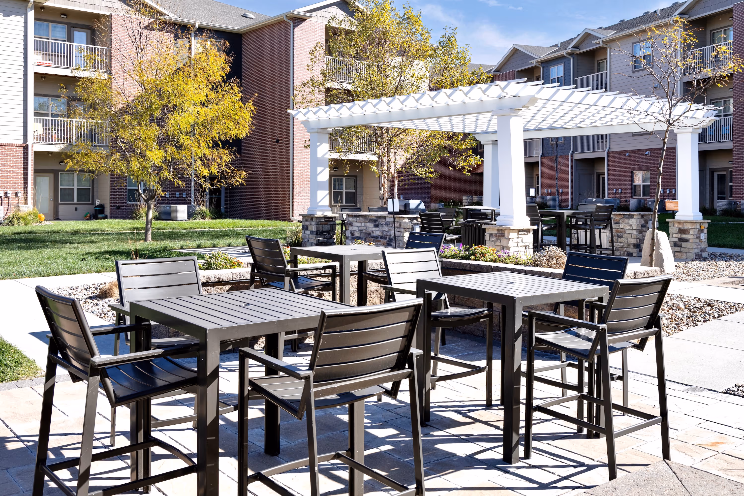 Pool area with firepit and outdoor seating