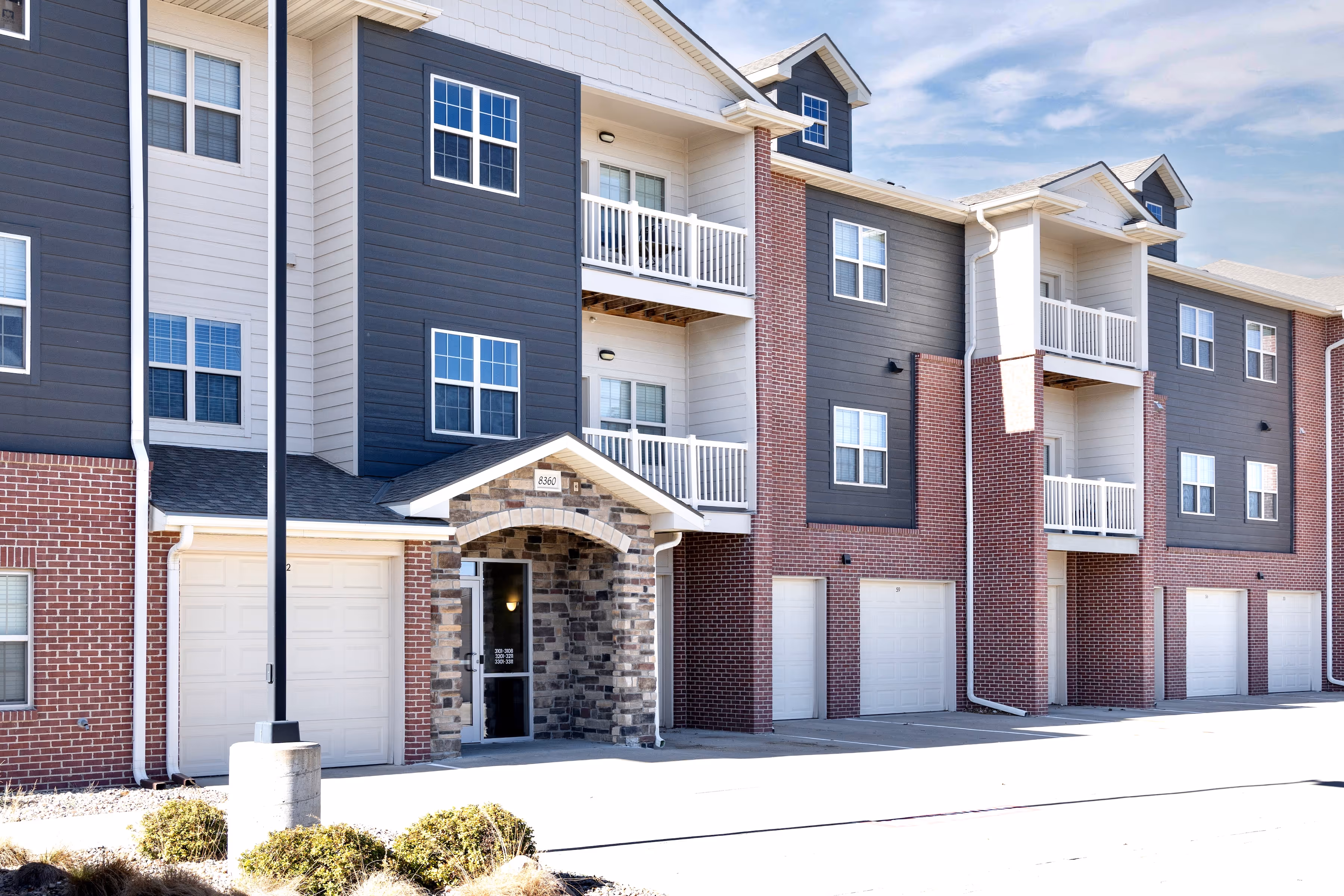 Exterior view of building and garages