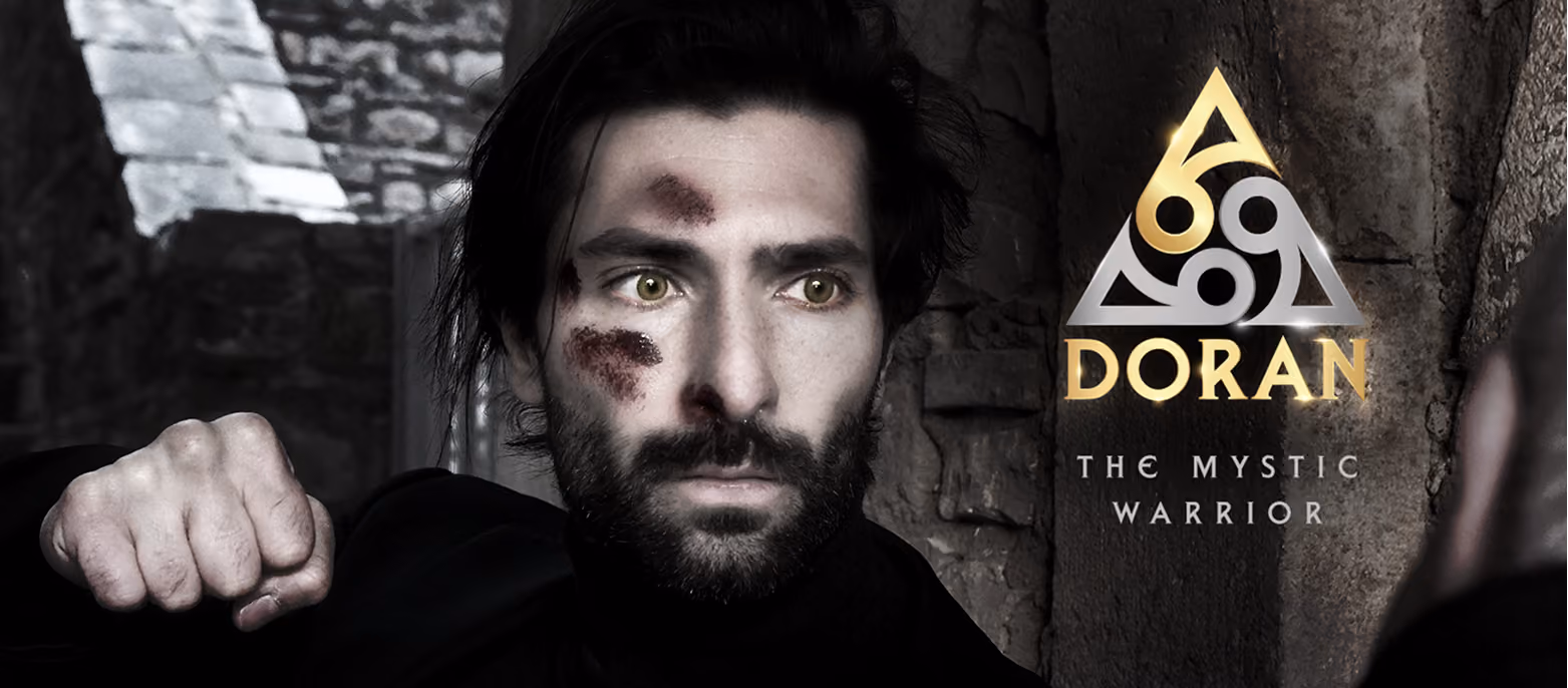 Close-up of a man with bruises on his face and a clenched fist next to “DORAN The Mystic Warrior” text and logo.