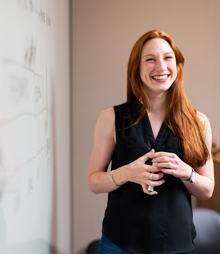 Woman using whiteboard