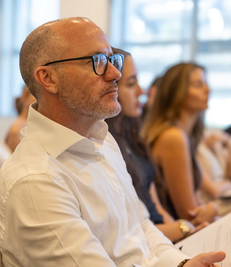 Man listening to a lecture
