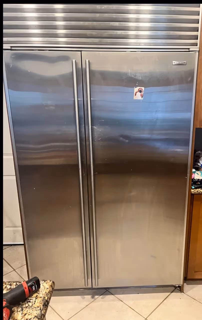 Stainless steel Sub-Zero French door refrigerator with bottom freezer drawer