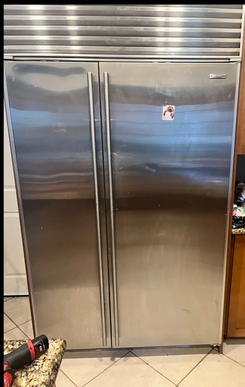 Stainless steel Sub-Zero French door refrigerator with bottom freezer drawer