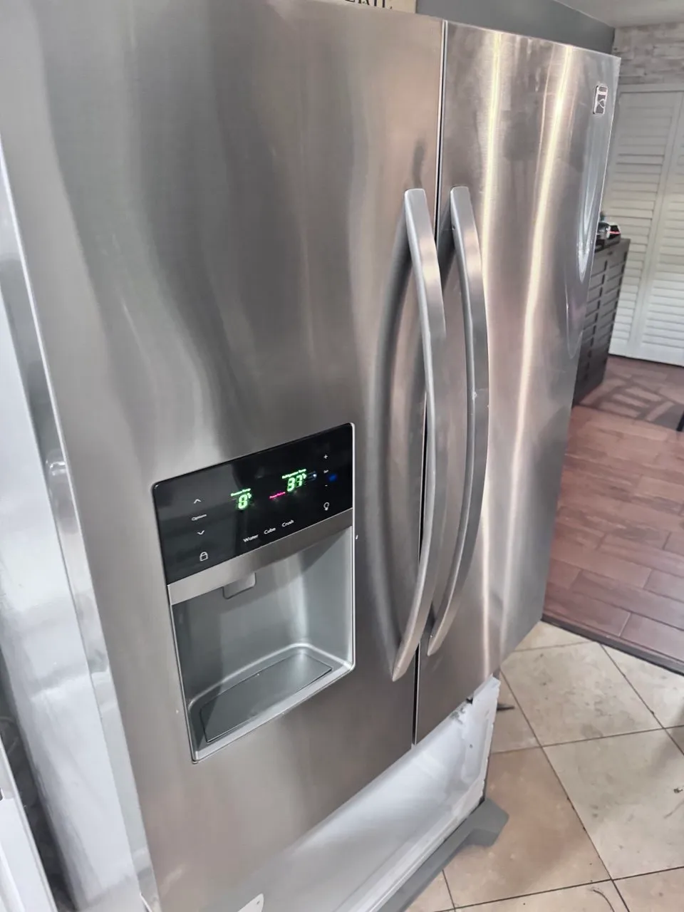 Stainless steel Kenmore side-by-side refrigerator