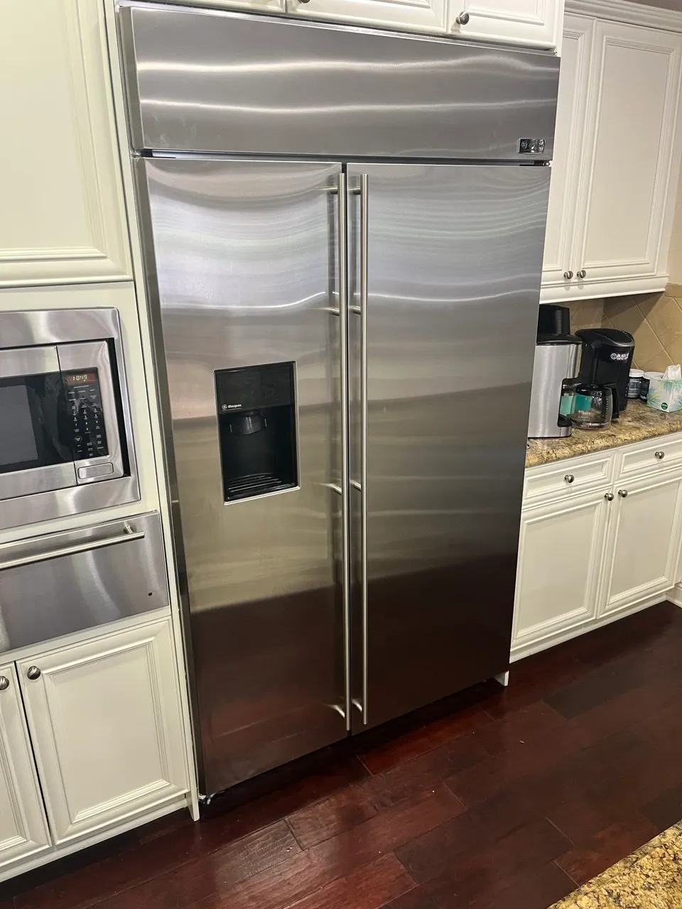 Large stainless steel GE built-in side-by-side refrigerator