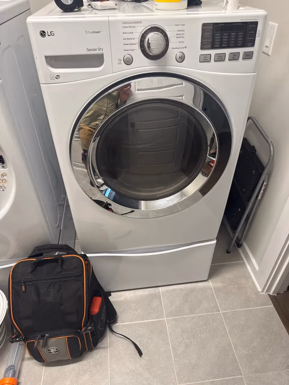 LG white front-load dryer with control panel