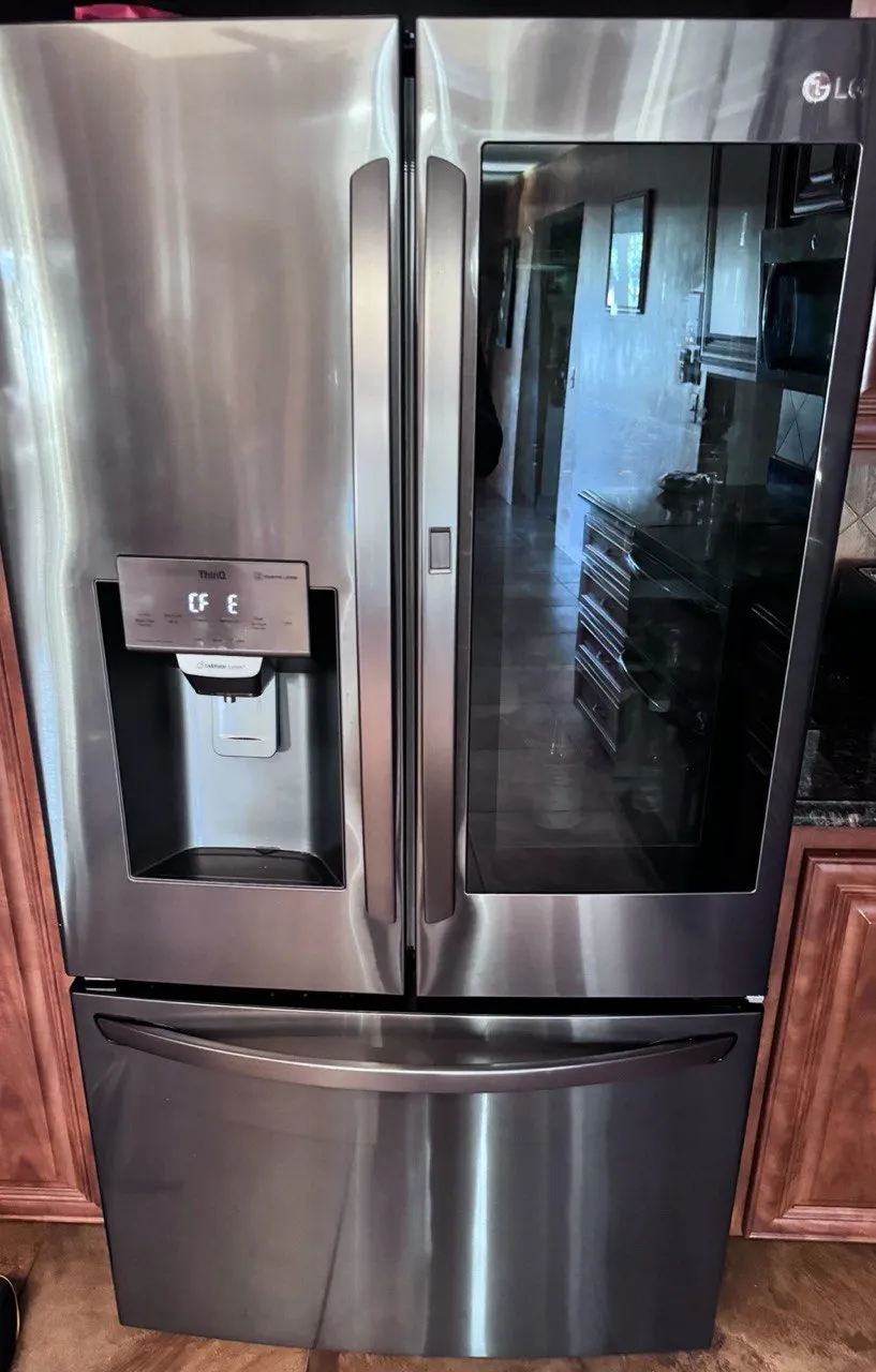 LG French door refrigerator with InstaView glass panel