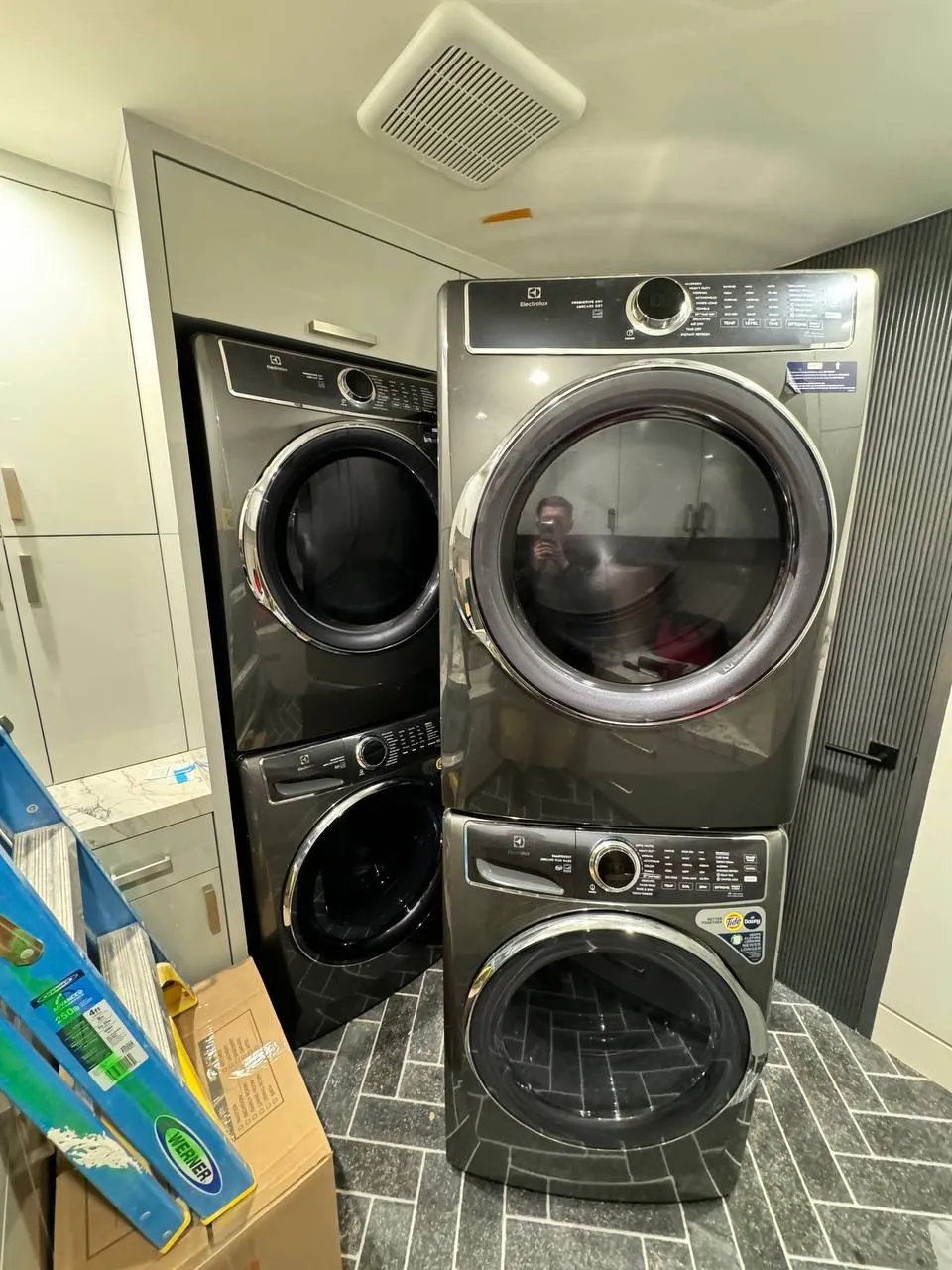 Stacked Electrolux front-load washers and dryers