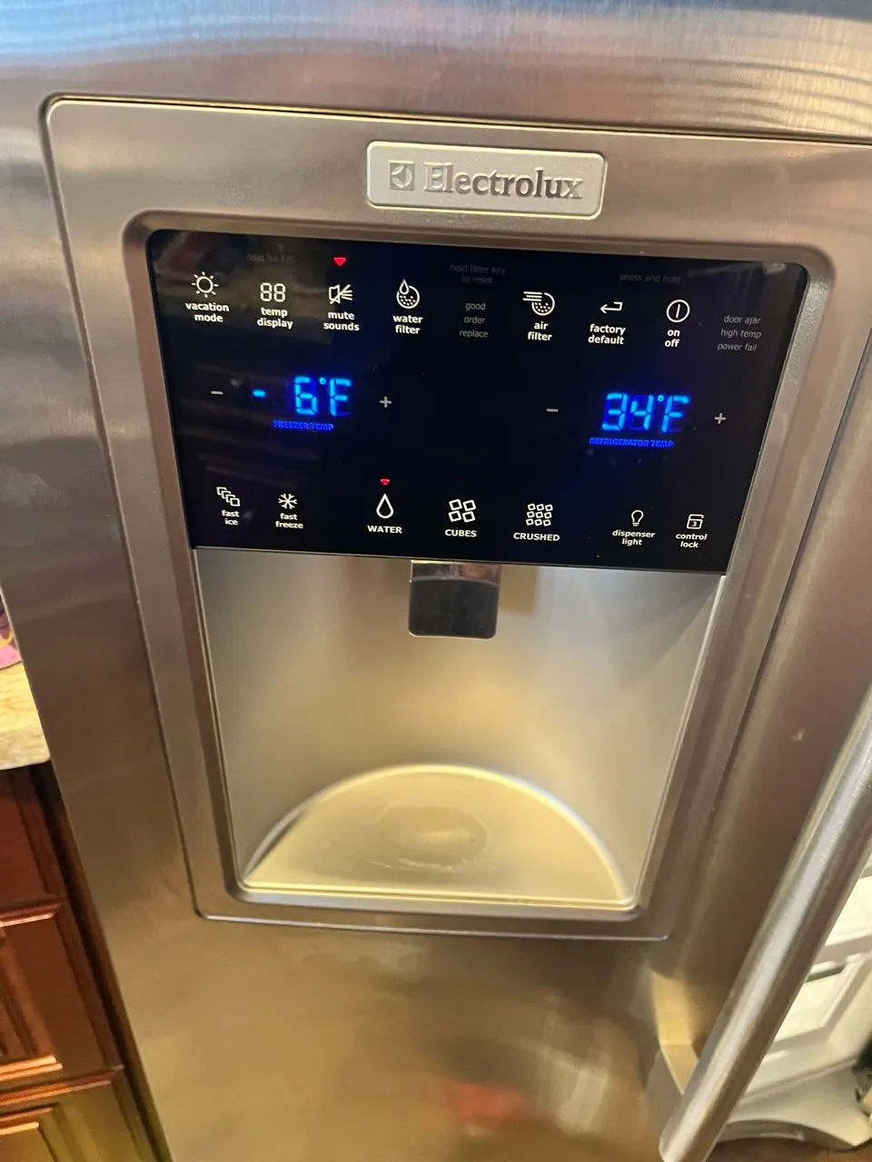Electrolux refrigerator digital dispenser panel showing temperature settings.