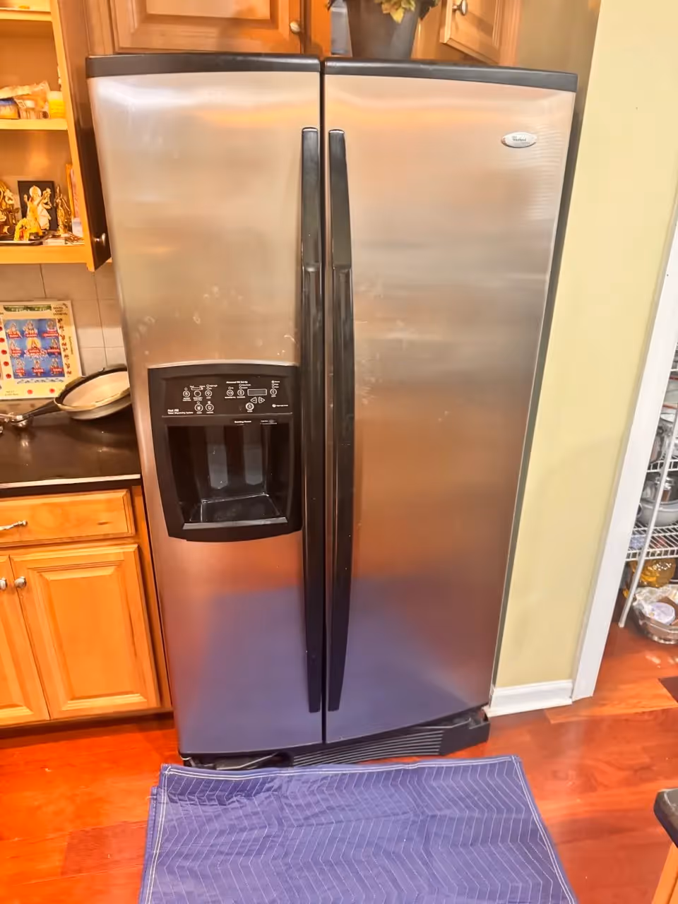 Whirlpool side-by-side stainless steel refrigerator