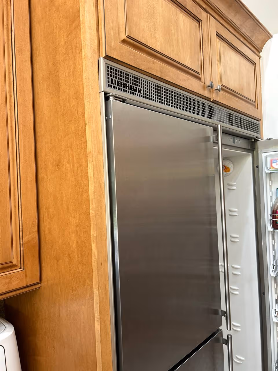 Stainless steel built-in refrigerator repaired by local appliance technicians