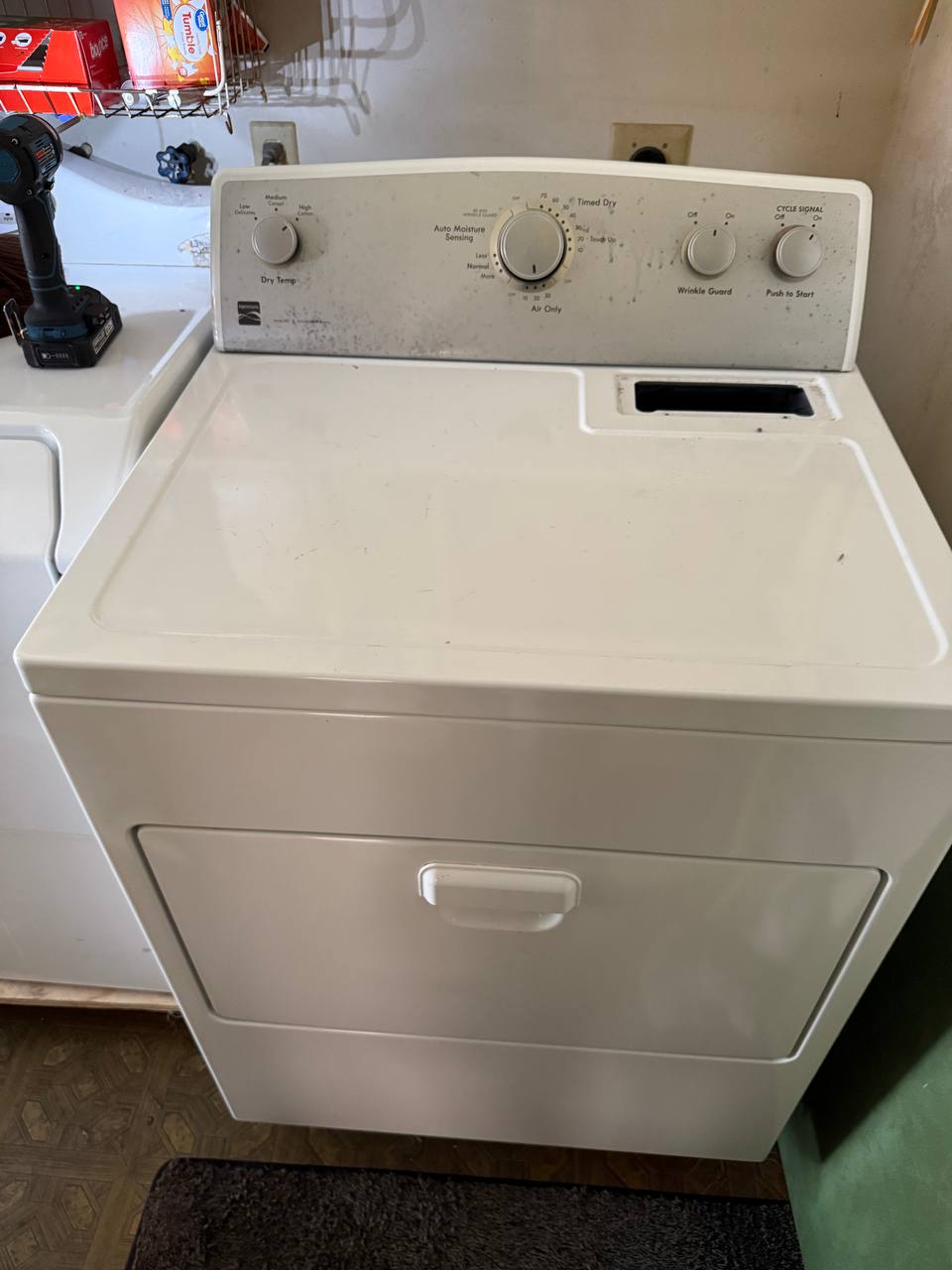 Residential dryer unit before repair service in Cornelius NC laundry room