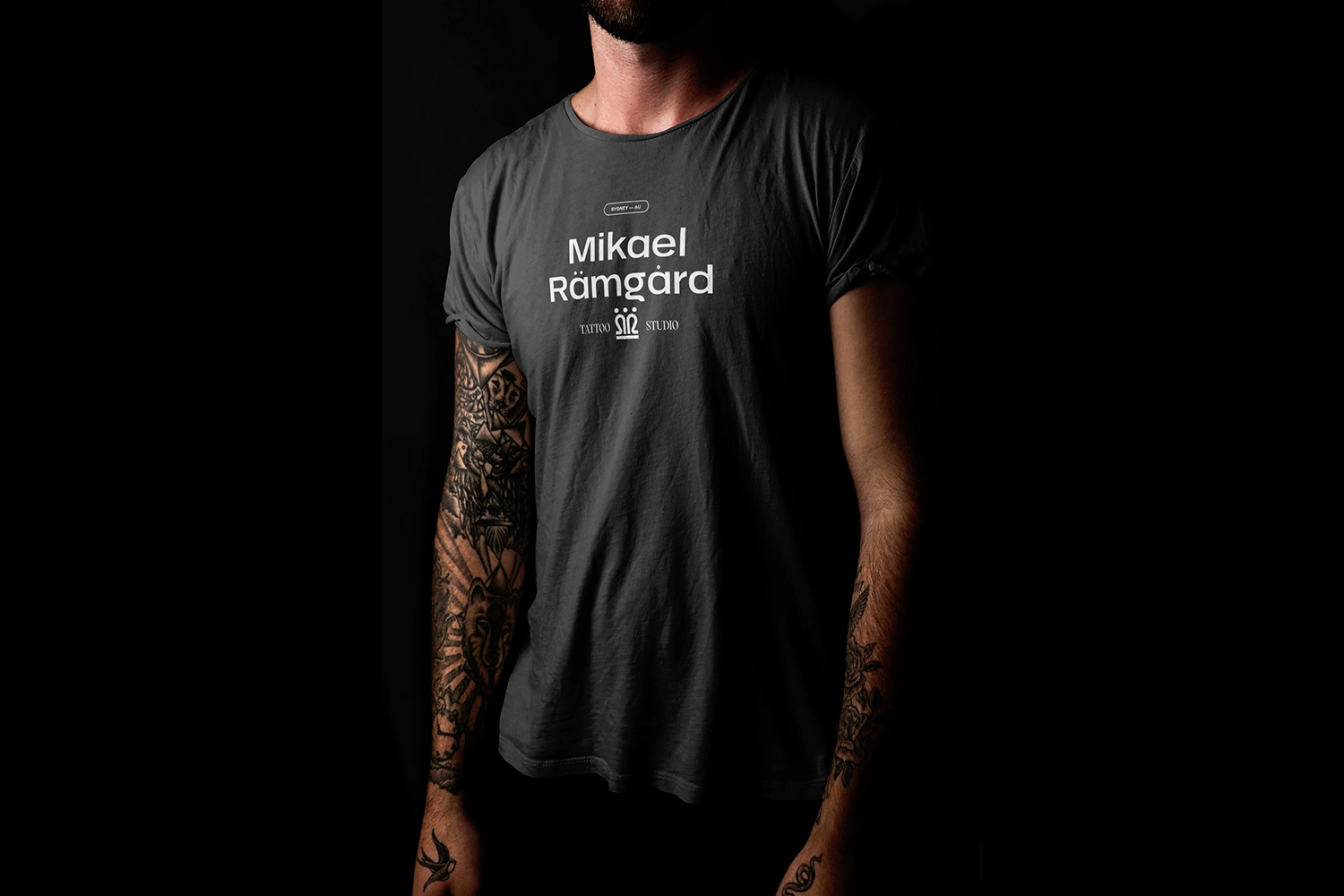 Black t-shirt with Mikael Rämgård studio branding in minimalist typography.