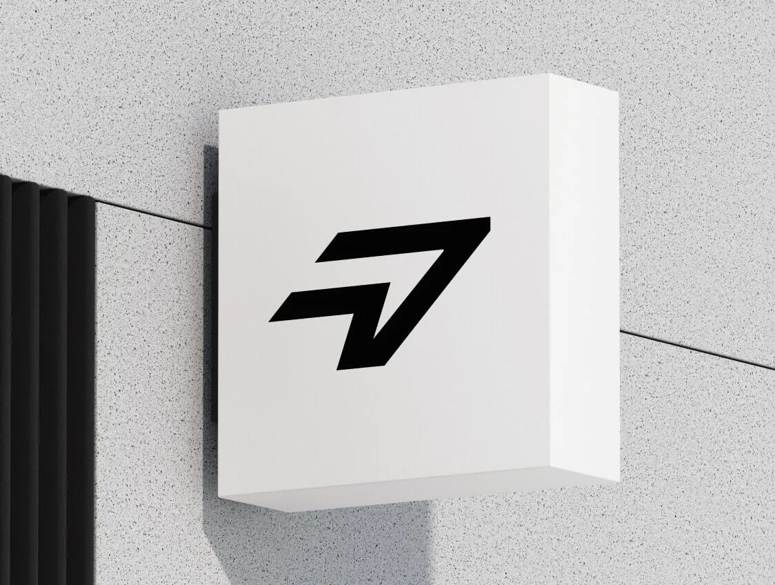 Outdoor signage featuring the Zuro logo in bold black on white cube.