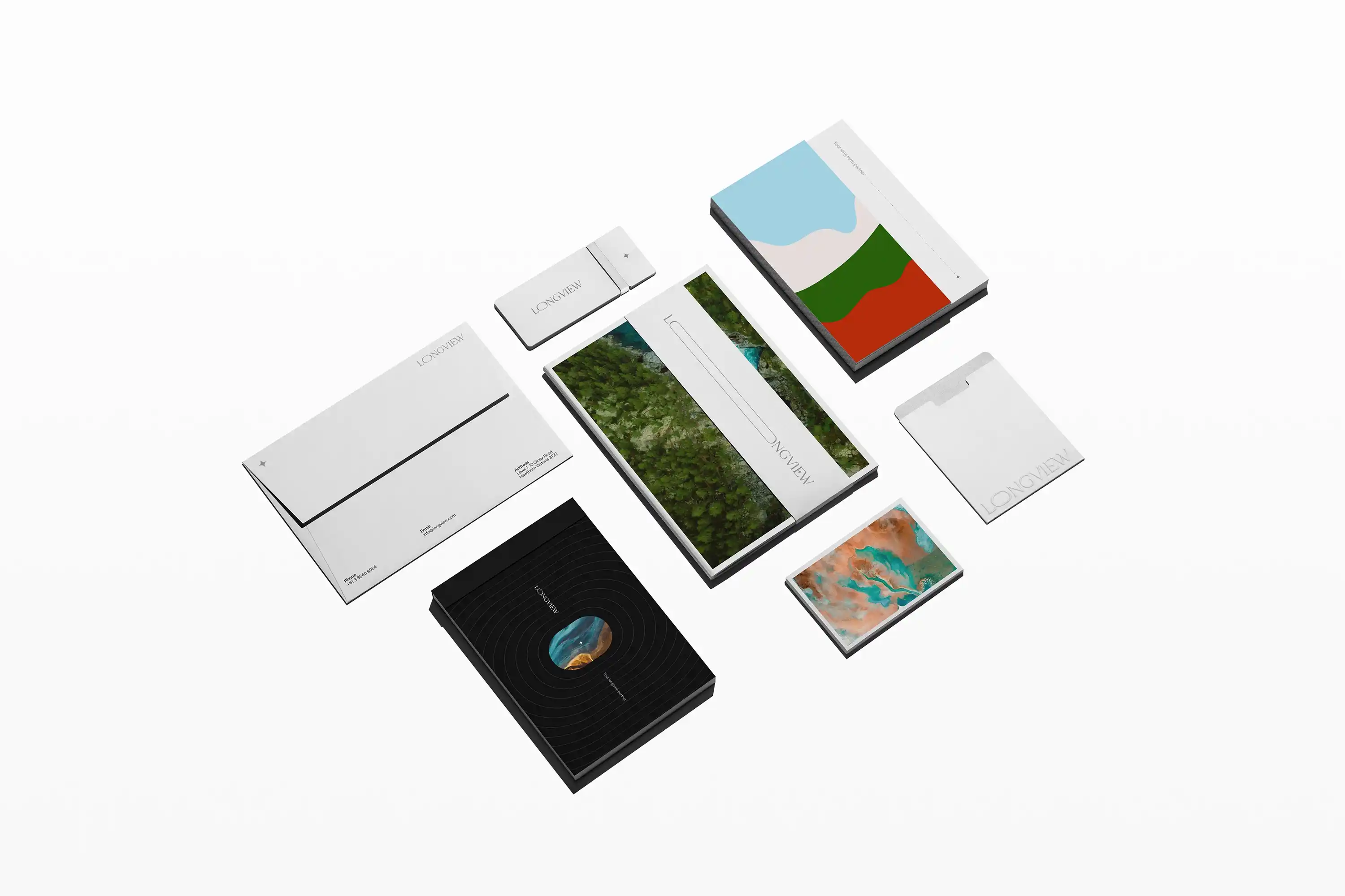 Modern glass house with warm interior lighting at dusk.