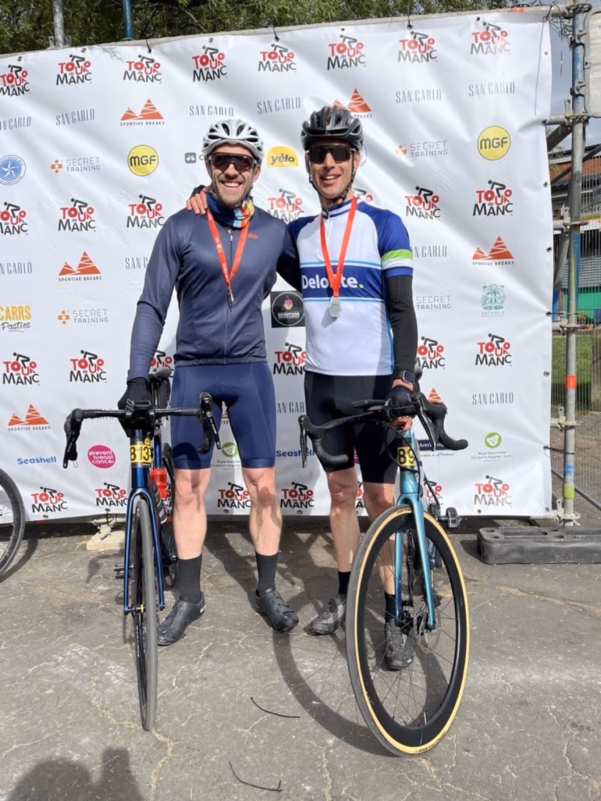 Two people with bikes