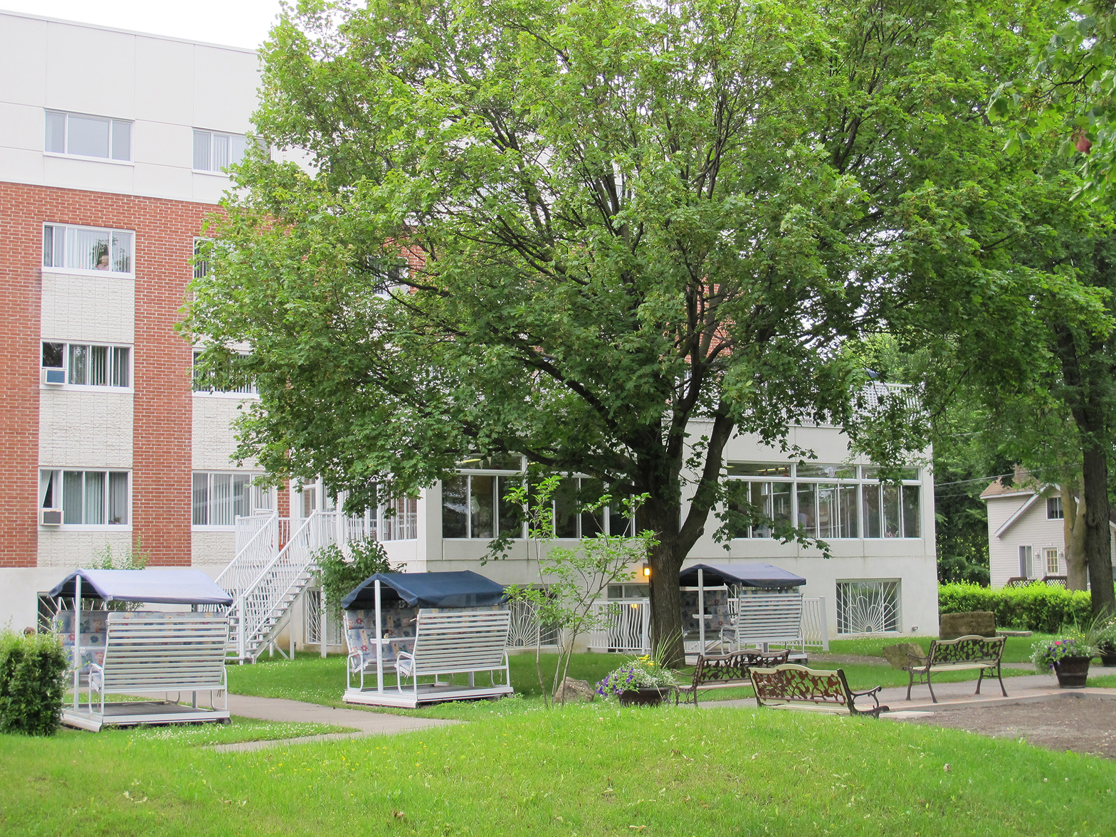 Resident exterior with trees