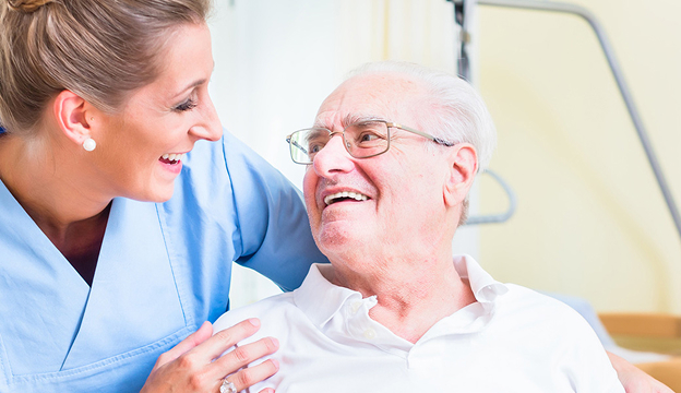 Senior resident with health care professional