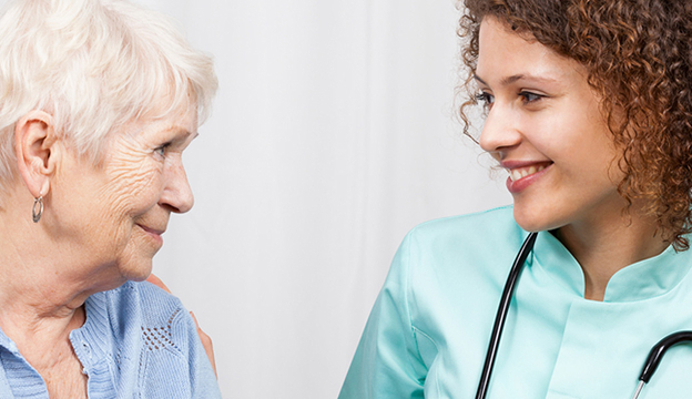 Medical professional with senior patient