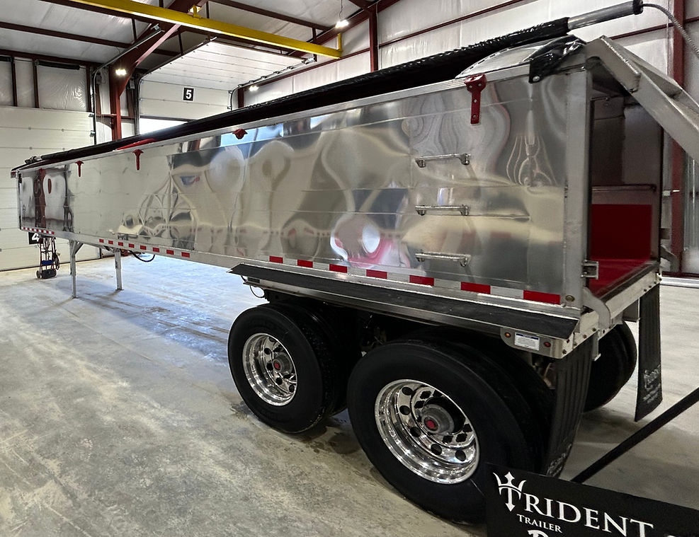 High angle view of aluminum trailer parked in nature