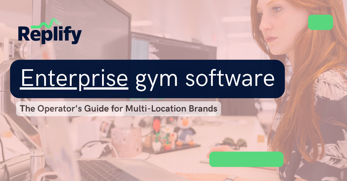 Enterprise gym software, an operators guide. Woman sitting at a desk working on complex enterprise gym software