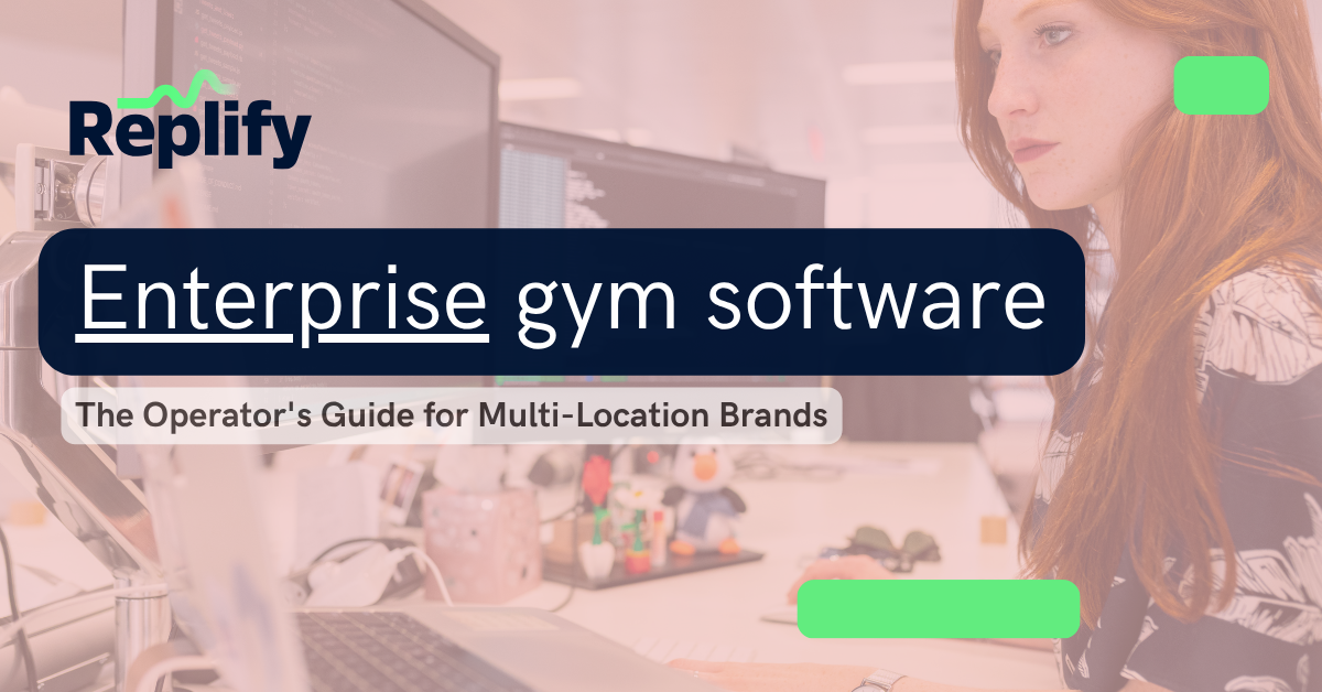 Enterprise gym software, an operators guide. Woman sitting at a desk working on complex enterprise gym software