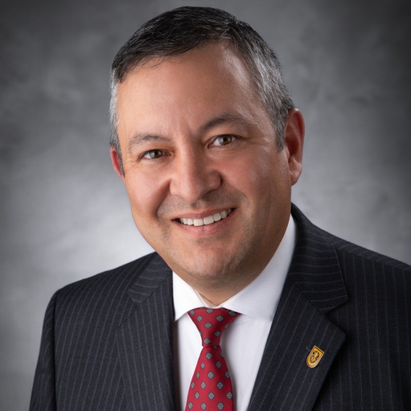 Michael S. Oshiki, President of Riverside Regional Medical Center & Acute Care Division at Riverside Health, featured in healthcare and leadership success story.