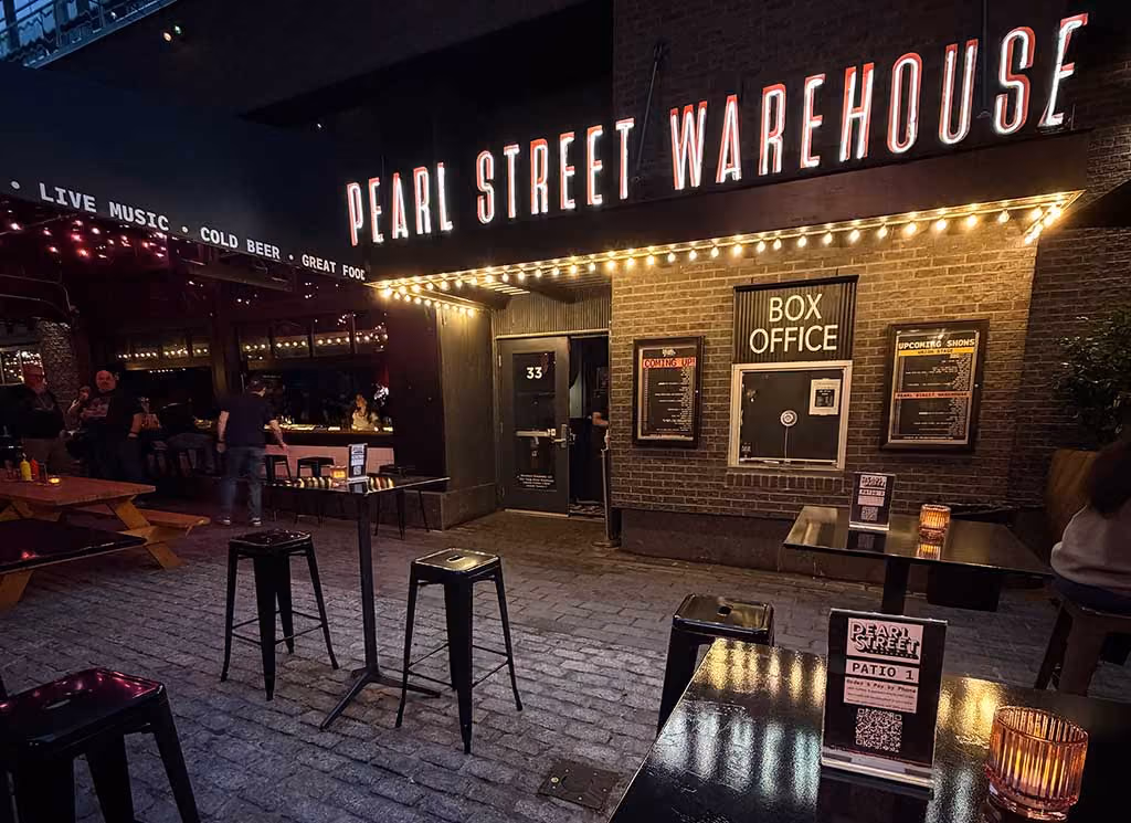 Pearl Street Warehouse patio and box office entrance at night