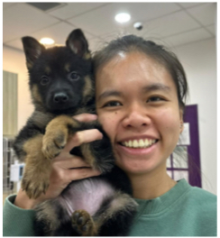 A vet holding a cute dog