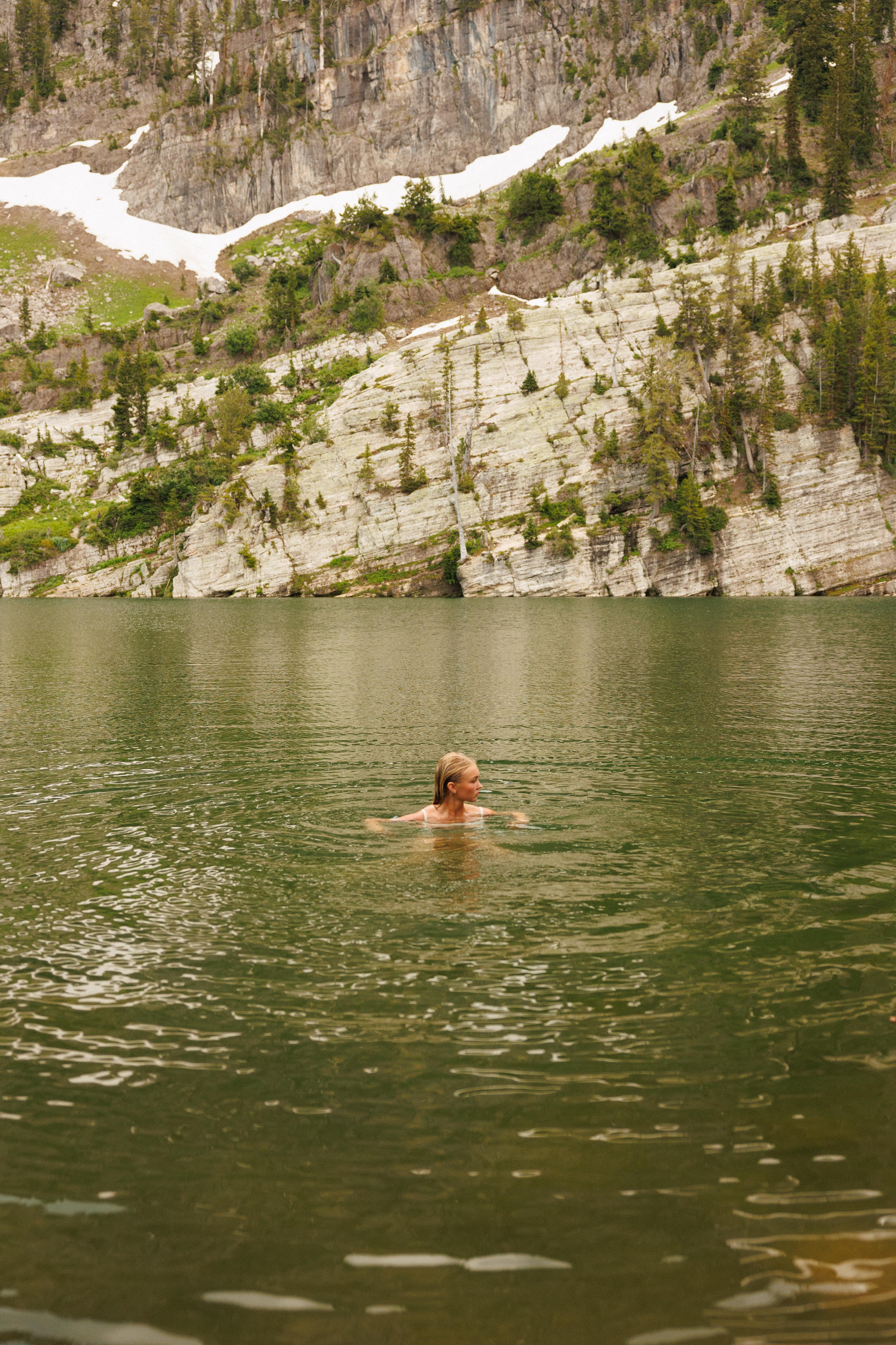 Girl in swimming in lake | Wood Films Utah Photography & Videography