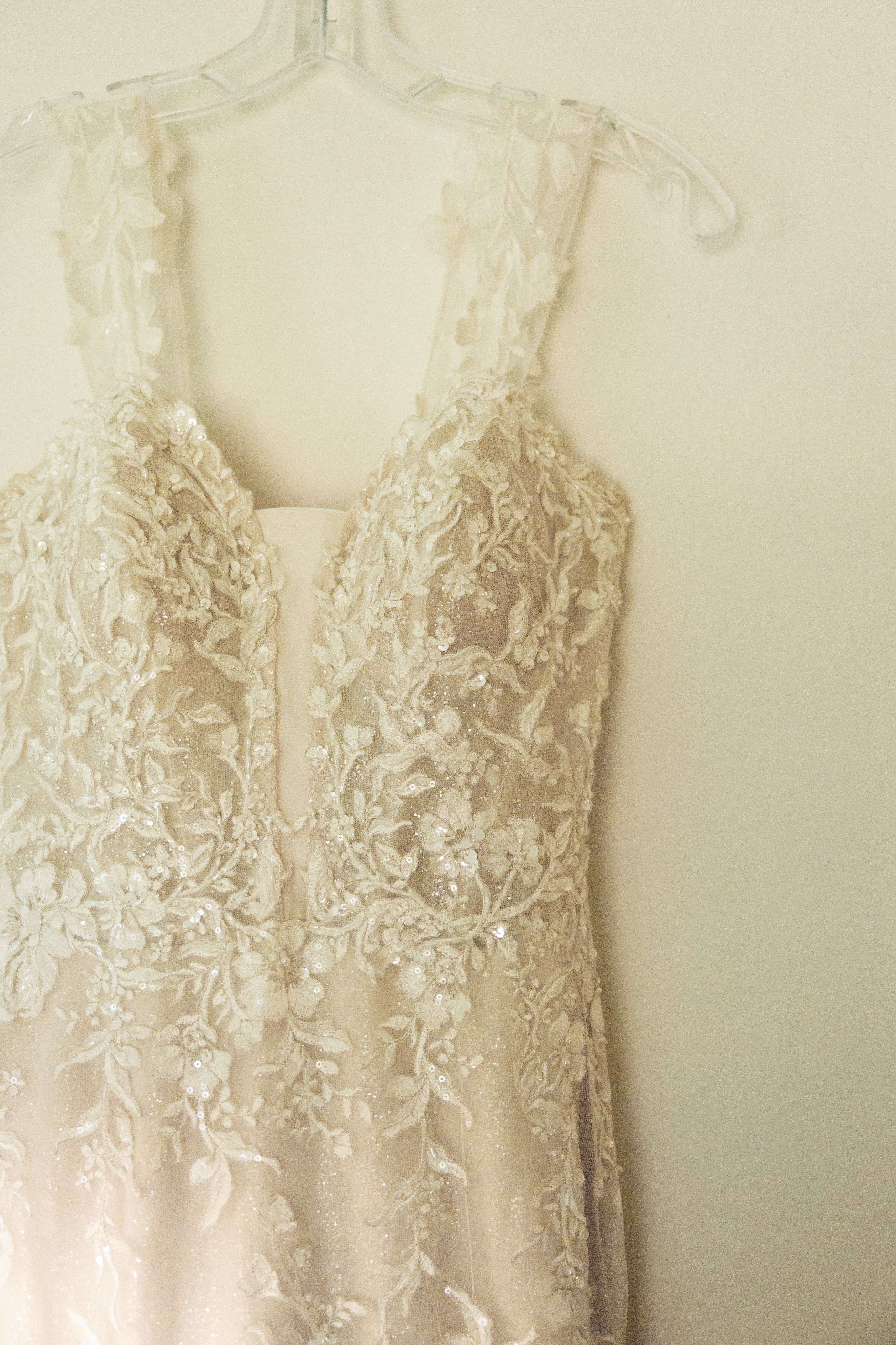 White wedding dress hanging | Wood Films Utah Photography & Videography