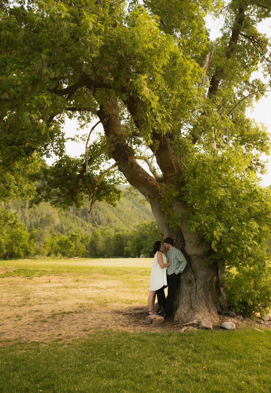 Romantic couple hugging by a pool on a rainy day | Wood Films Utah Photography & Videography