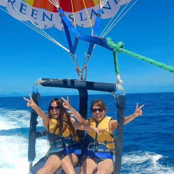 Close up of parasailers.