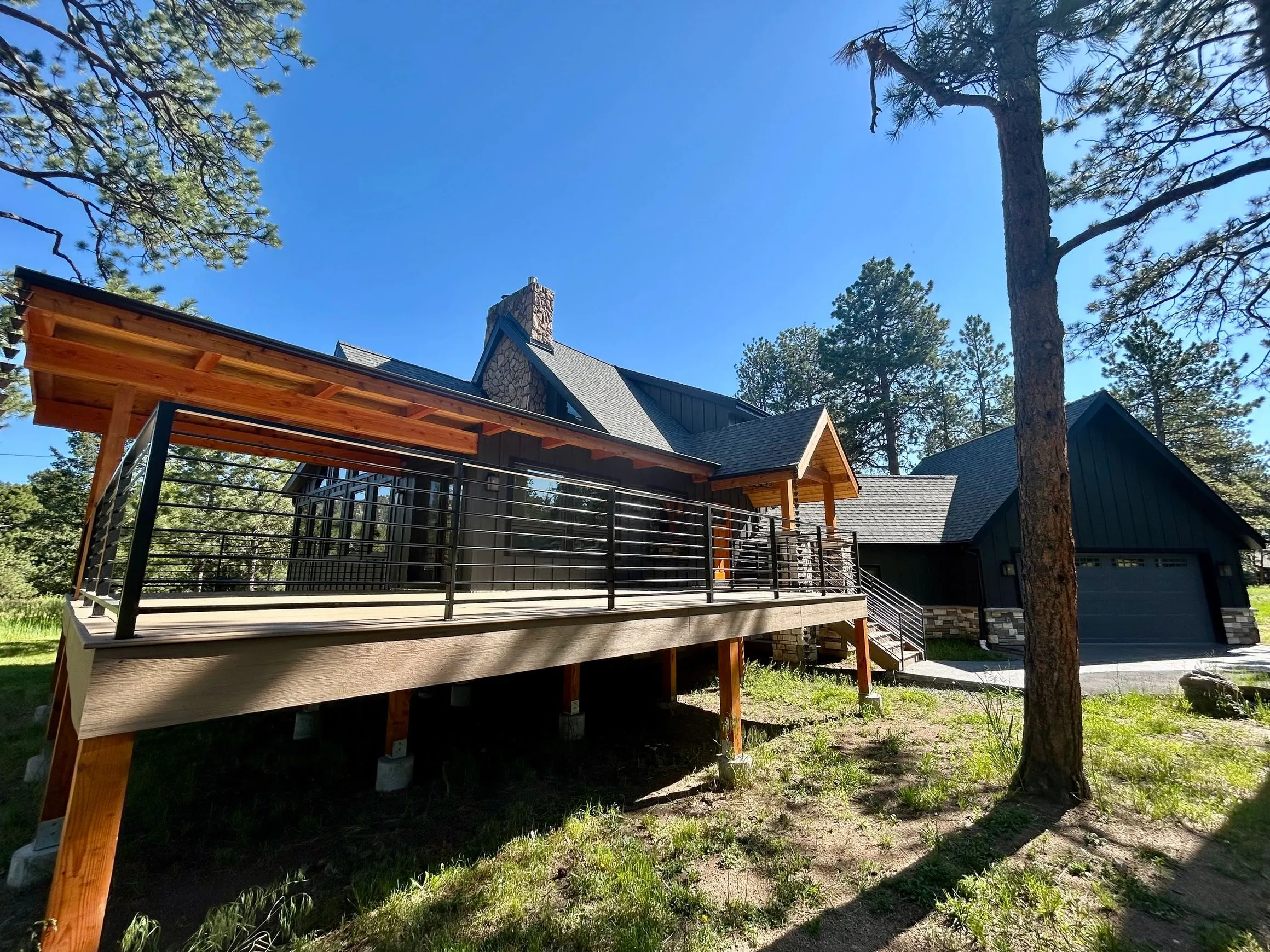 Deck and siding staining on mountain home near Evergreen CO — Kibray Paint and Stain