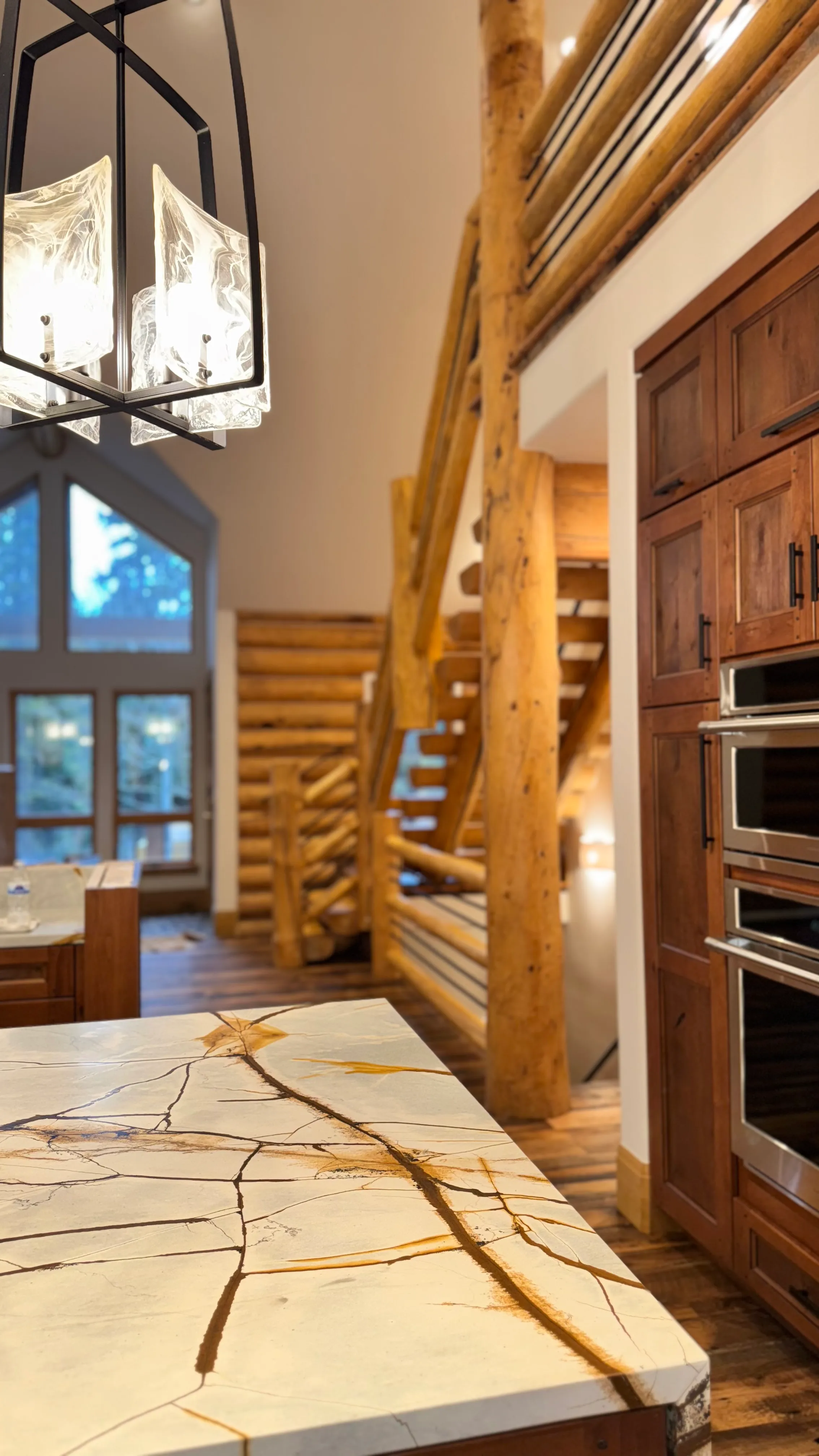 Interior log home staining and chinking near Grand Lake CO — log cabin painting contractor Grand County