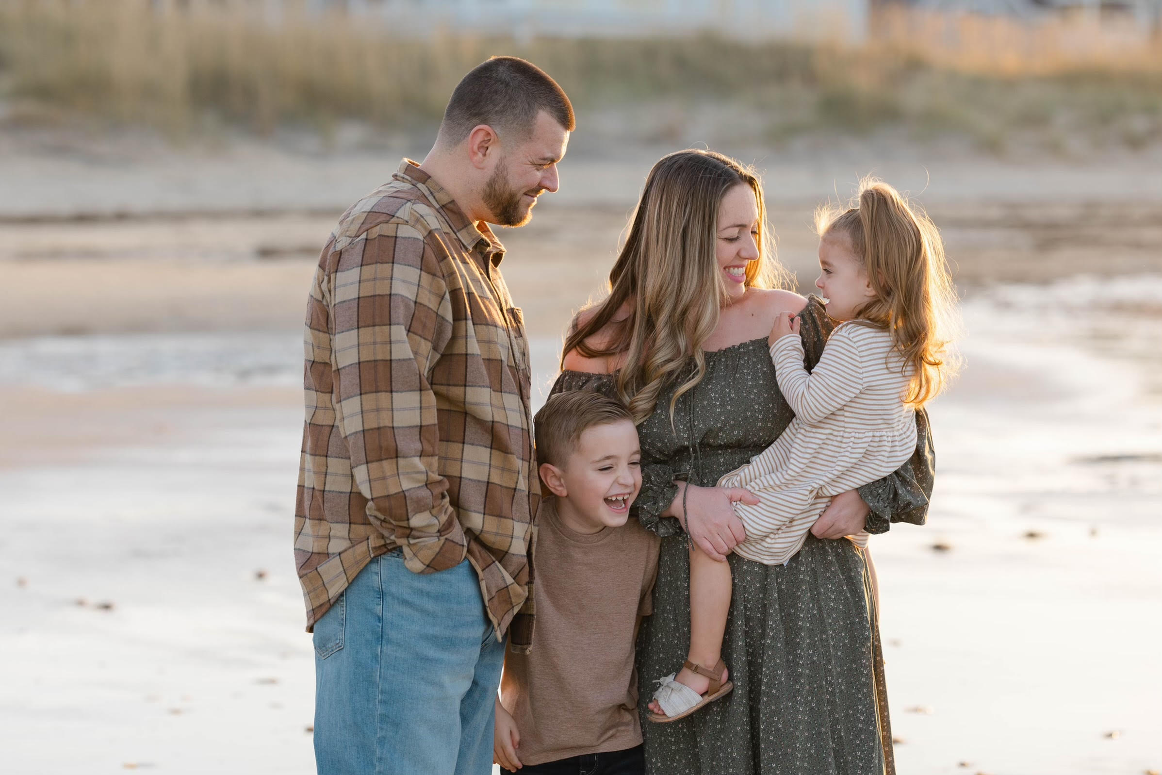 Matt Chiaverotti in uniform sitting down smiling.