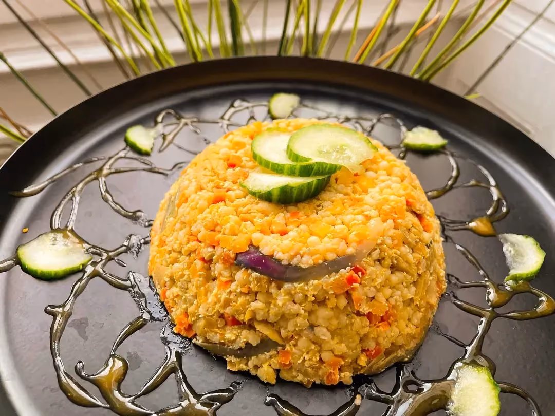 Resembling an upside-down bowl, this brunoise has taken on the orange color of the carrots.