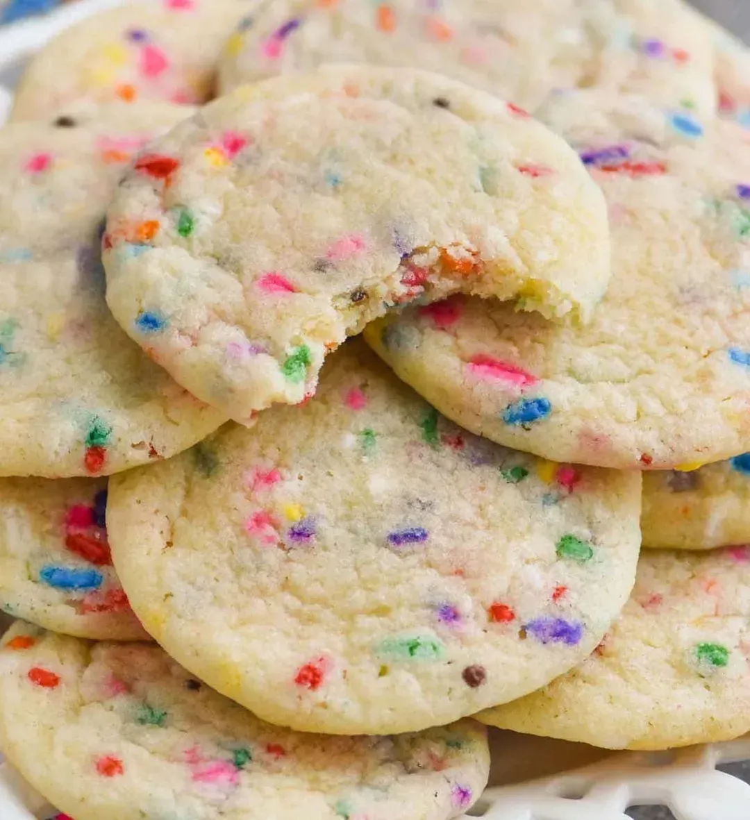 Festive cookies with little pops of color from the rainbow sprinkles. Perfect for the holiday season!