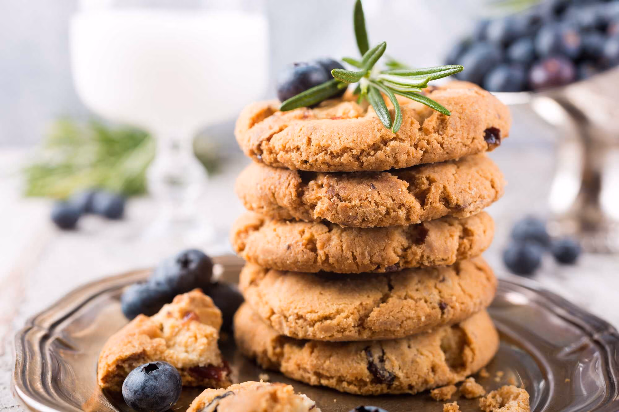 Cookies on a silver plate with blueberries