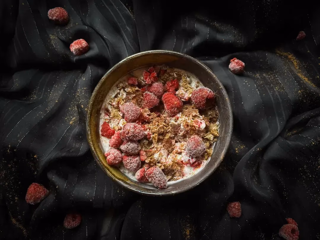 Raspberry fromage blanc is served in a large stoneware bowl.
