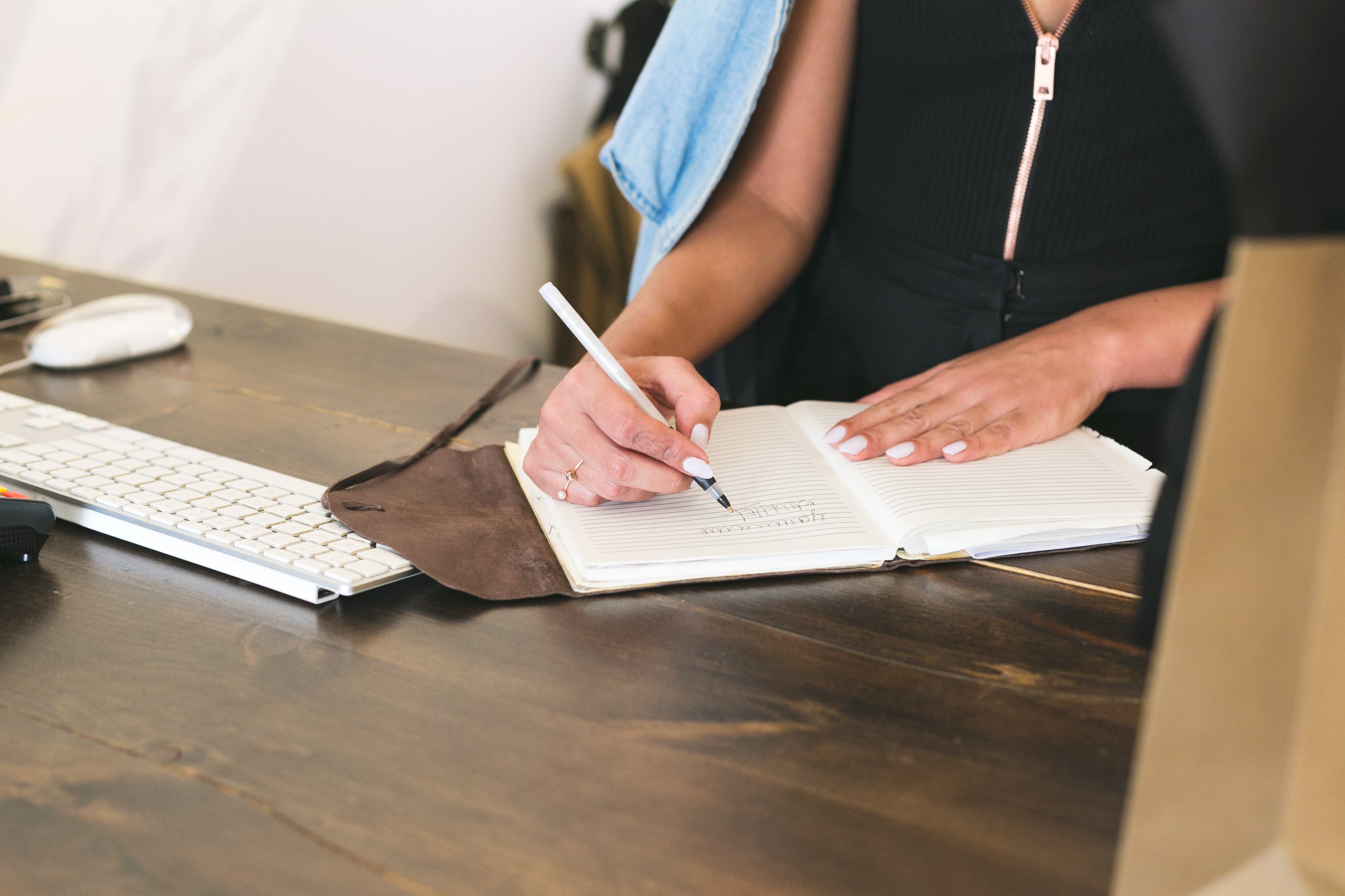 Small business owner reviewing notes