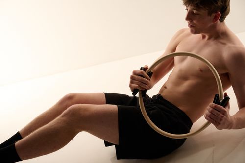 Experienced member Pulse movement with a Pilates Ring to demonstrate all level compatibility