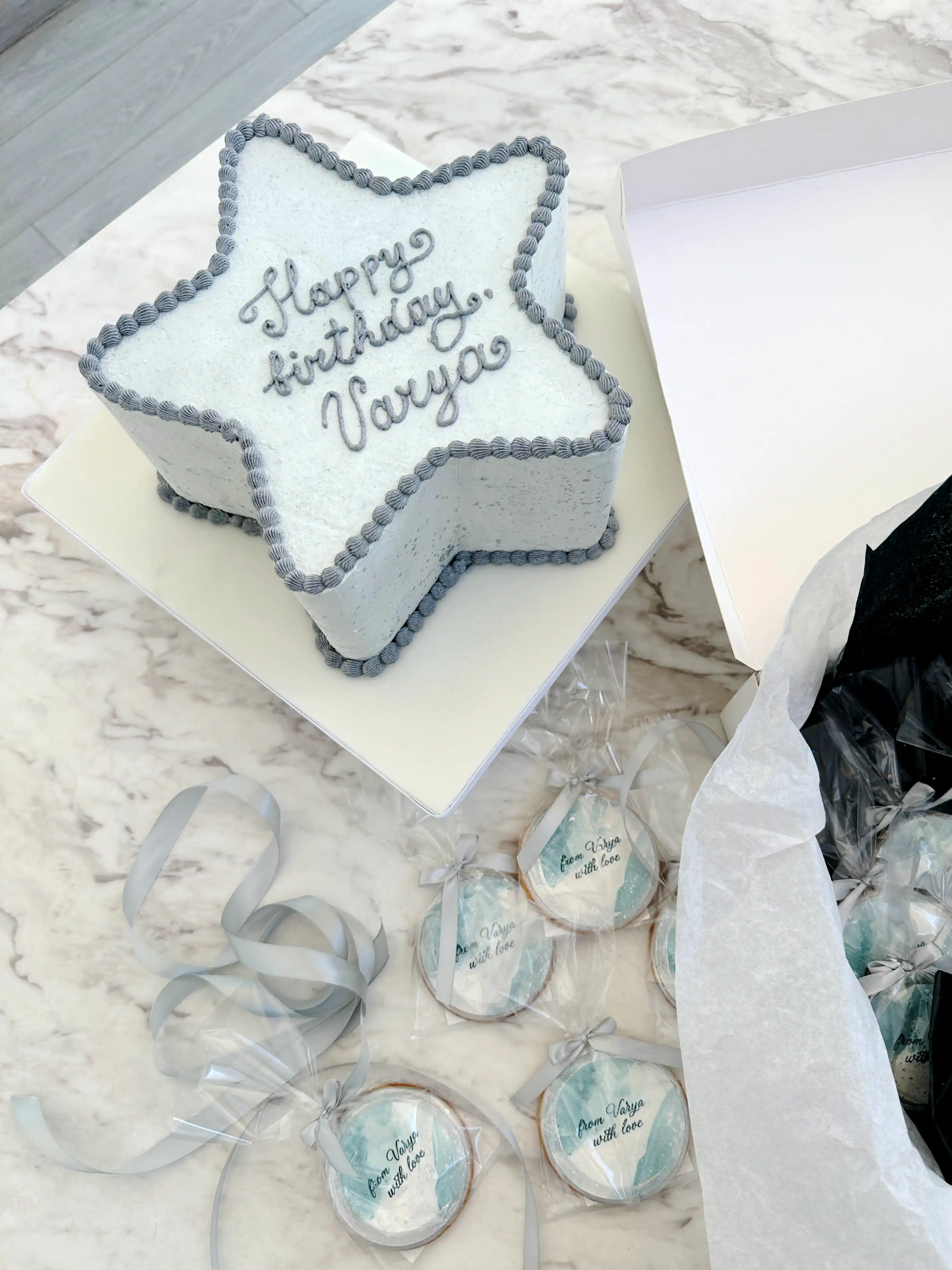 Star shaped birthday cake for girl with soft pastel buttercream and personalised message, elegant celebration cake in cyprus