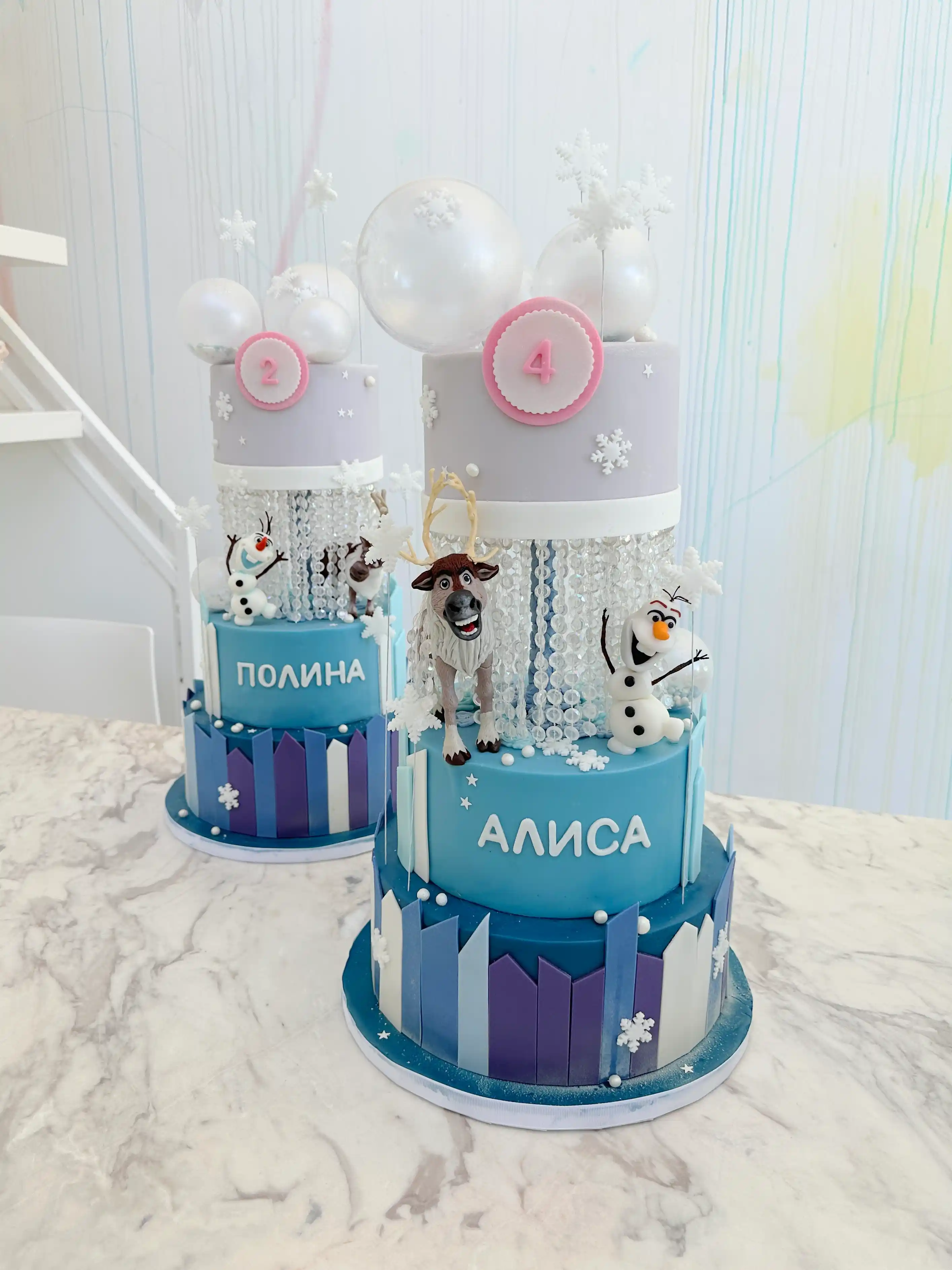 Frozen themed birthday cakes for girls with elsa, olaf and sven decorations, custom twin celebration cakes in cyprus