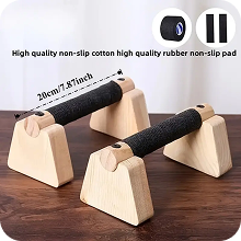 Wooden push-up bars with black non-slip cotton grips and rubber pads on a wooden surface.