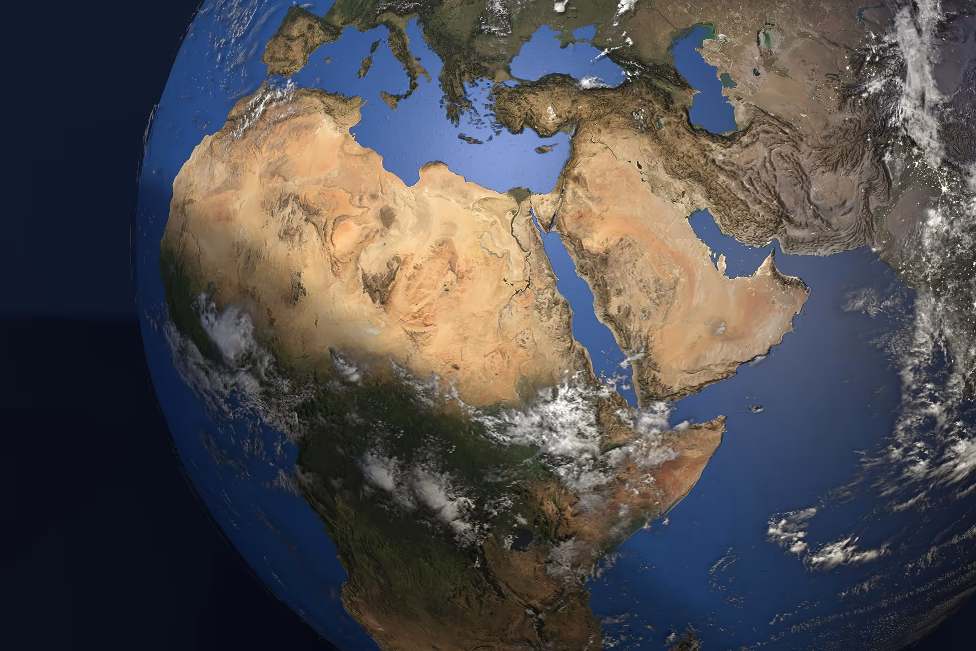 Satellite view of Earth showing Africa, the Middle East, and parts of Europe with visible deserts and seas.